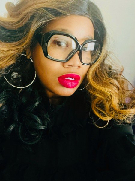 Kedra L. Curry, Secretary & Director
