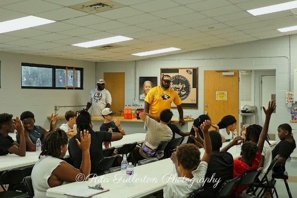 Community leaders interacting with participants